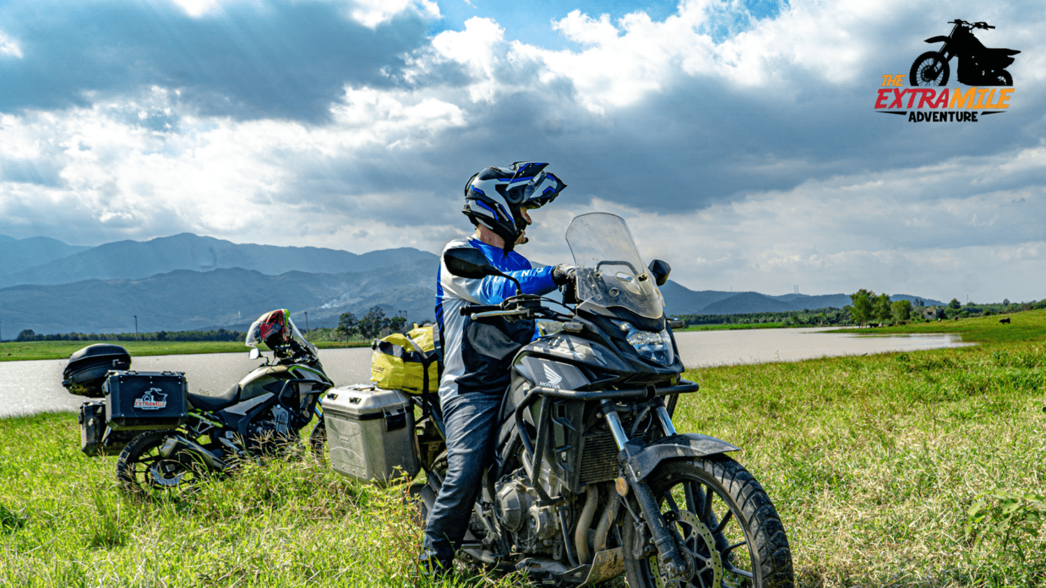 114 - CENTER - Quang Binh - lake and big bikes searching direction and enjoying beautiful scenary The Extra Mile Adventure Motorbike Tours Vietnam