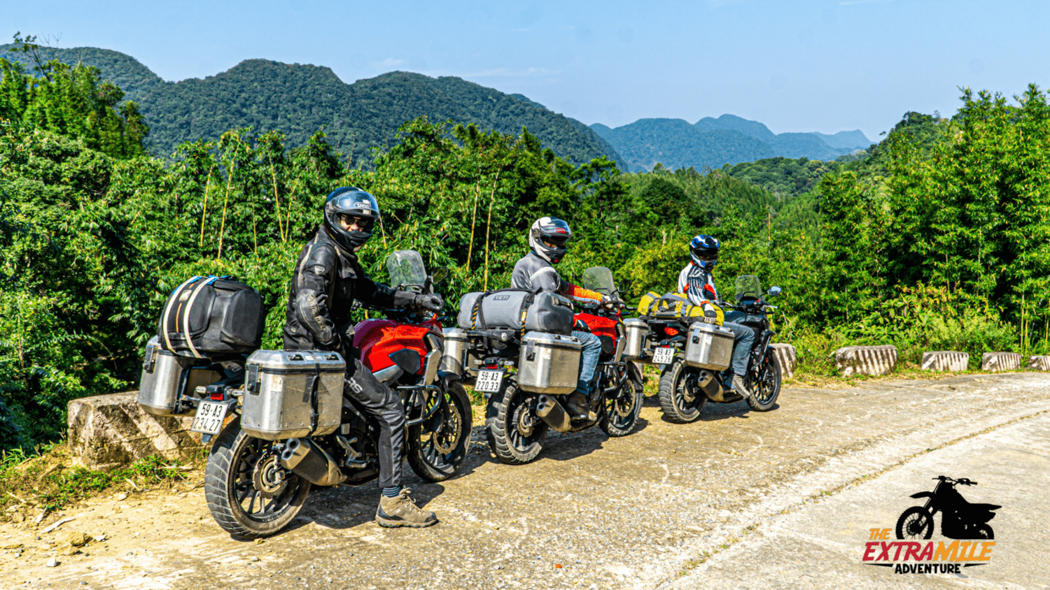 143 - NORTH - Hoa Binh - ready to hit the road with honda cb500x fully equiped for mountain ride with nice jungle view on a dirt road The Extra Mile Adventure Motorbike Tours Vietnam